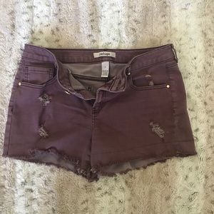Distressed maroon jean shorts